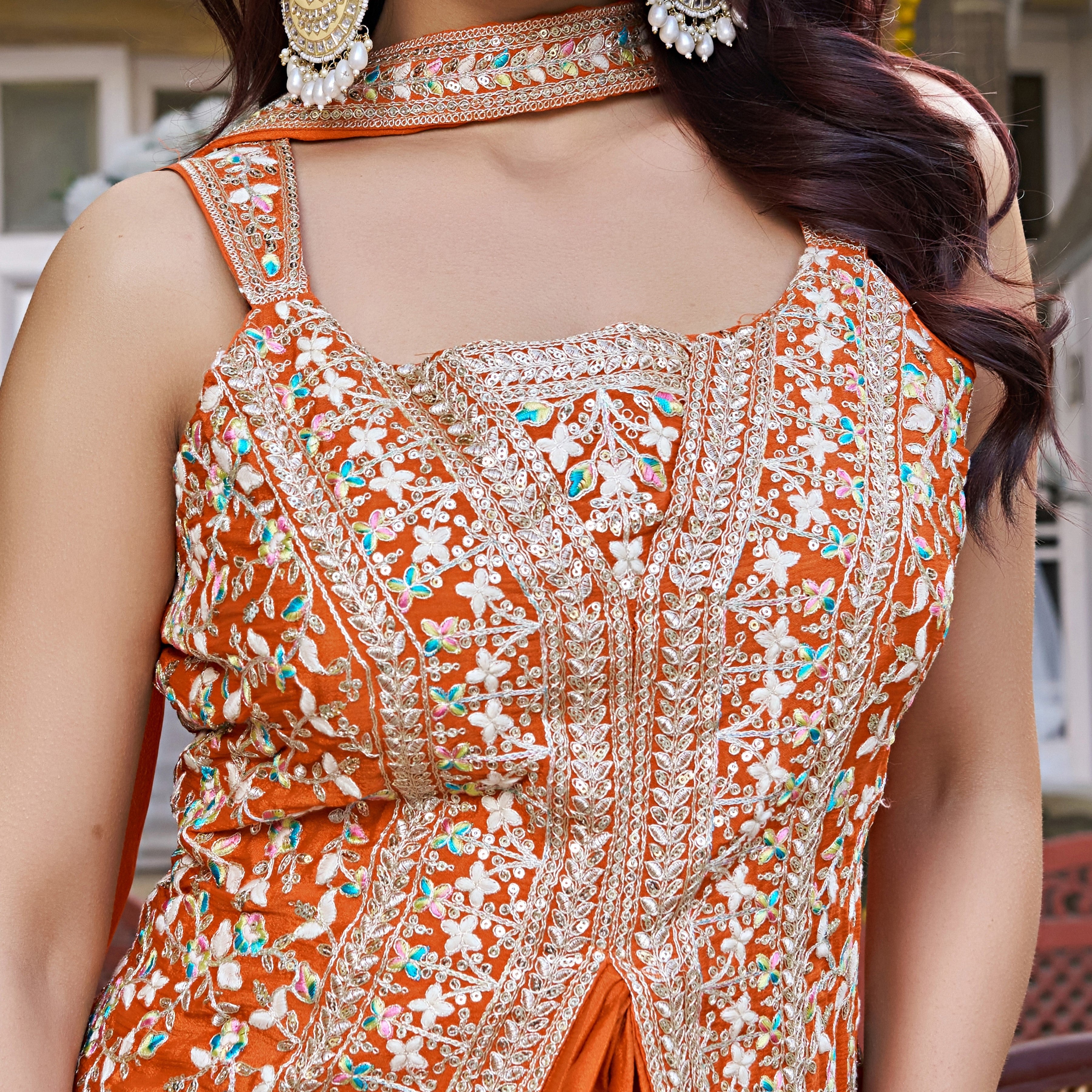 Rust Orange Floral Handwork Peplum Top for Festive Wear