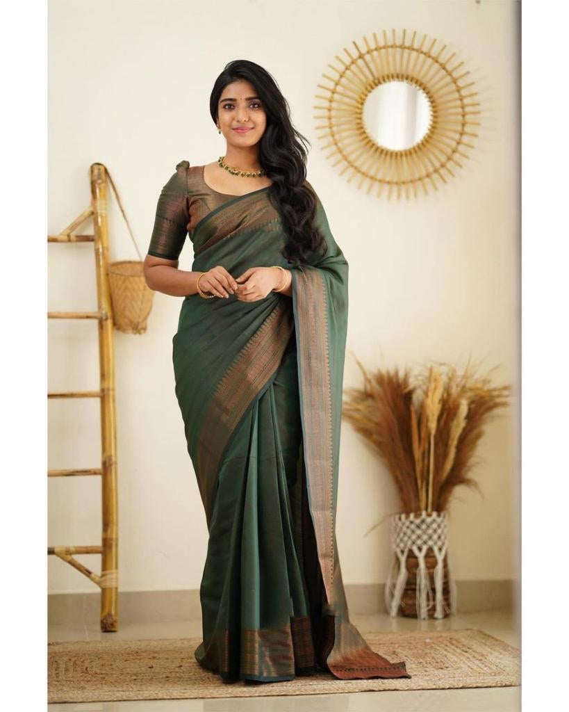 Conflate Green Soft Silk Saree With Murmurous Blouse Piece