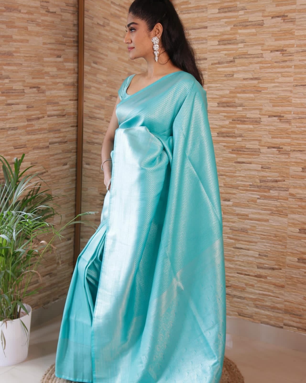 Light Blue color soft silk banarasi saree with matching blouse.